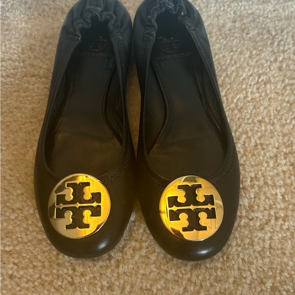Tory Burch Shoes - Tory Burch Black and Gold Flats with Iconic Logo